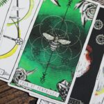 Up close picture of "Four of Pentacles" tarot card.